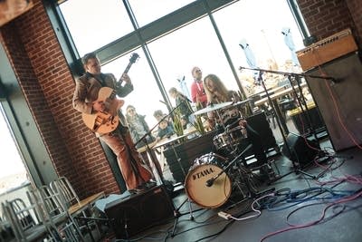 Two musicians performing in a taproom