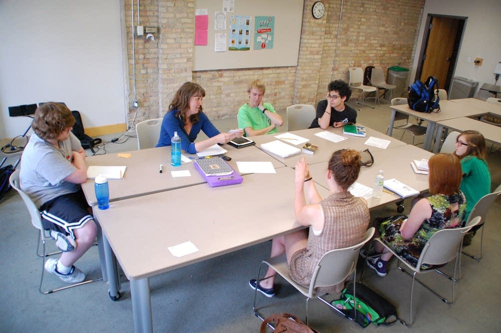 Teenagers attend a writing class at the Loft
