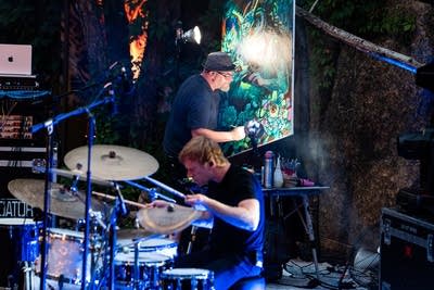 Cloud Cult performing on stage