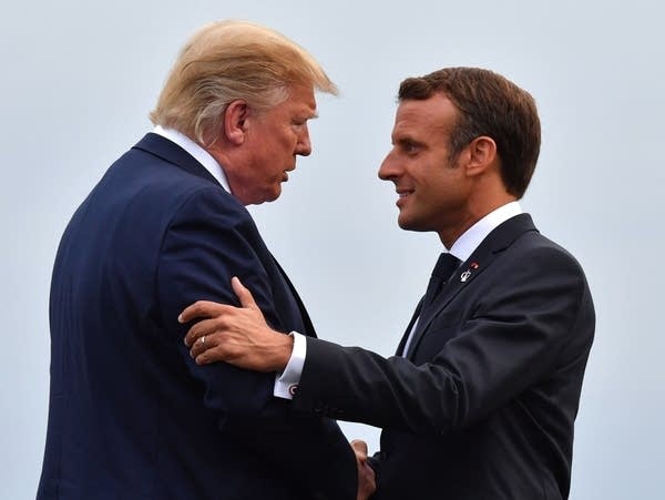 French President Emmanuel Macron welcomes U.S. President Donald Trump