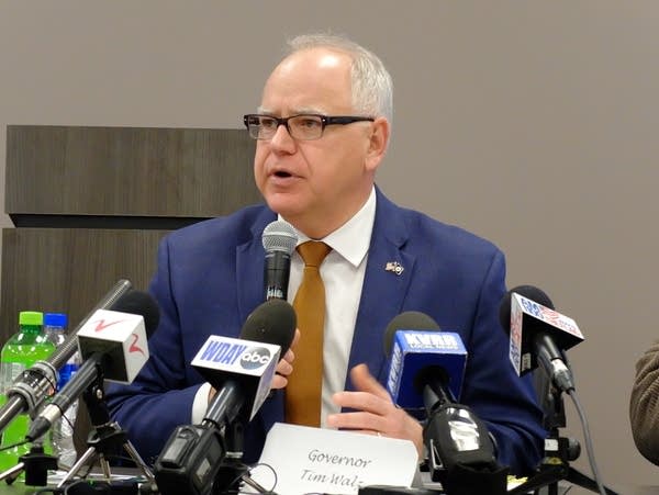 Gov. Tim Walz speaks to local officials Monday in Moorhead.