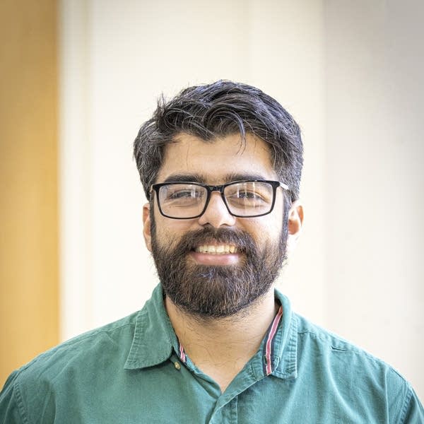 A man poses for a portrait.