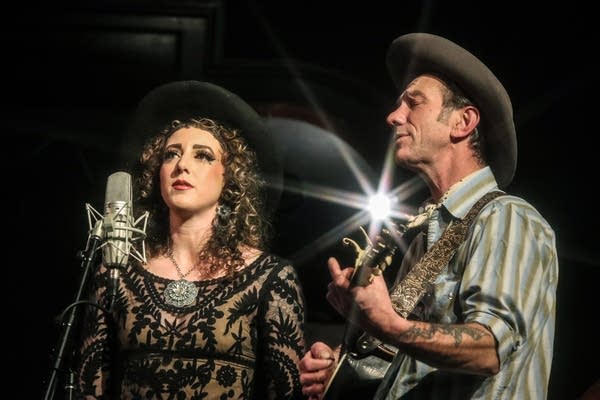 The Sapsuckers, comprising Nikki Grossman (fiddle, vocals, guitar) and Joe Hart (guitar, vocals, mandolin), write and perform original country music that blends humor, heartache, and honky-tonk.