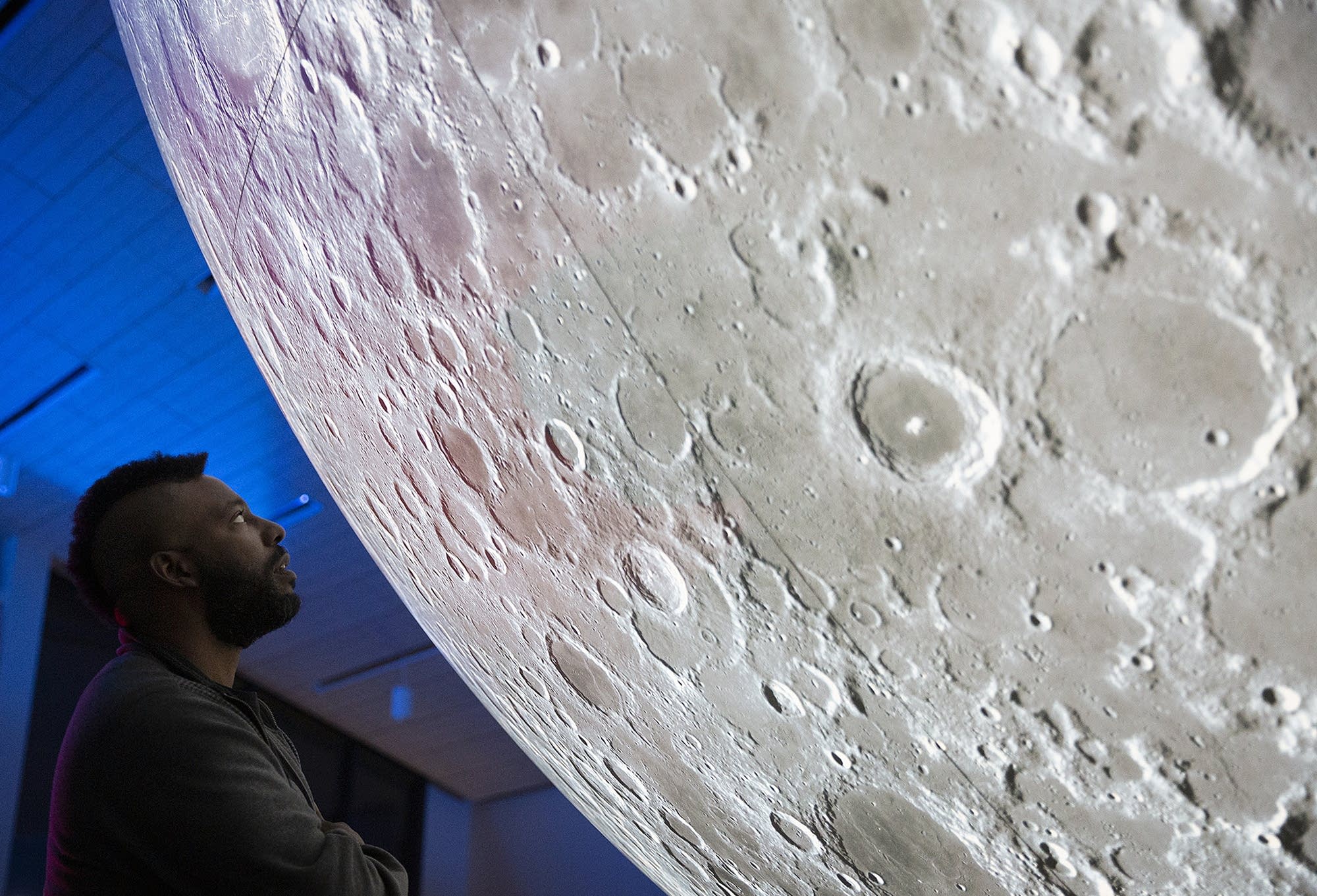 Artist Donald Thomas gets an upclose view of the