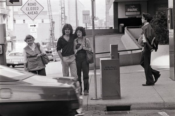 A couple stands outside the Dayton's department store.