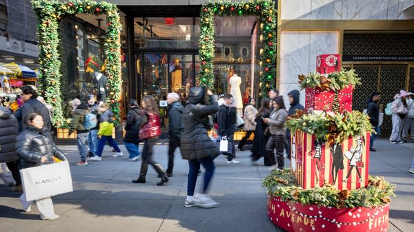 Consumers are still splurging on things like foreign travel, vehicles and eating out — and that bodes well for holiday spending.