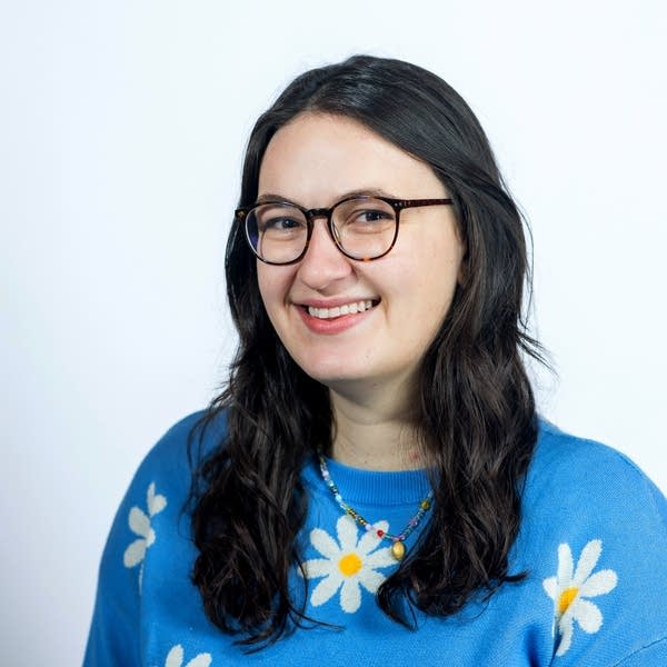 Woman smiles for a portrait