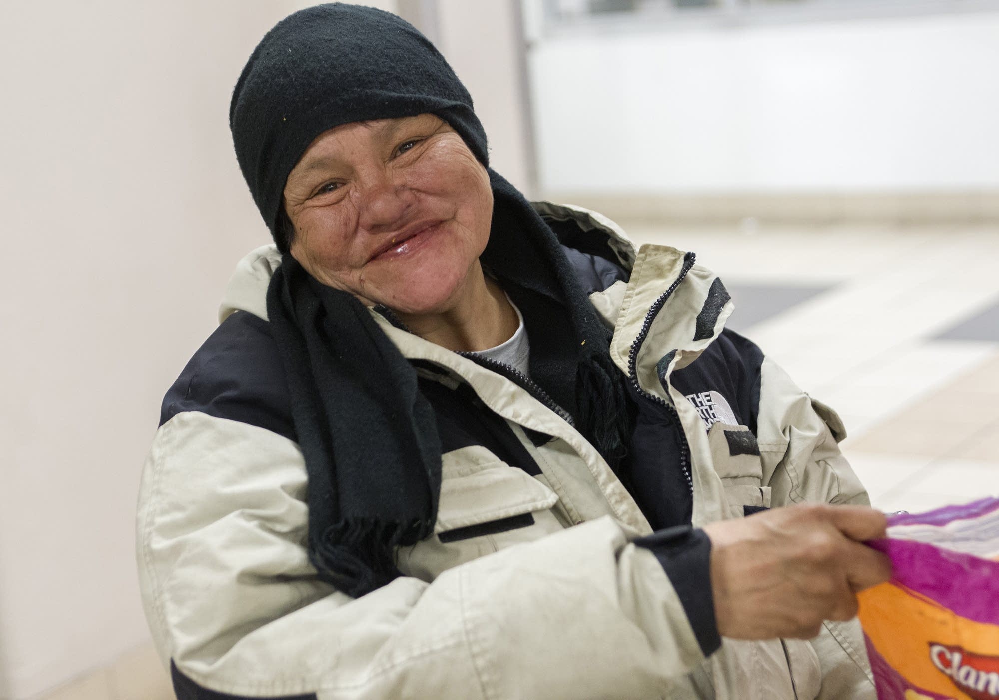 Mattie Grassrope is one of dozens who wait indoors at the LRT at the MOA.