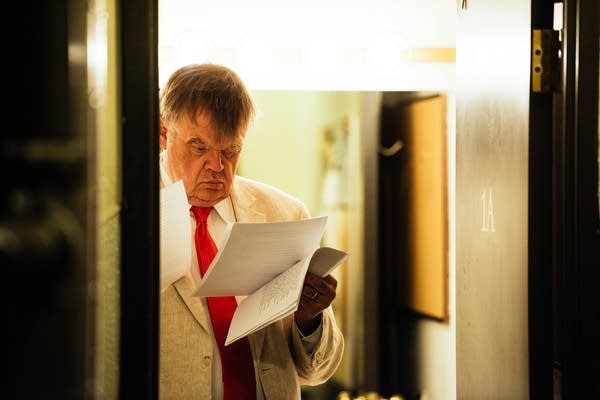 Keillor reads through scripts backstage at the Fitzgerald Theater