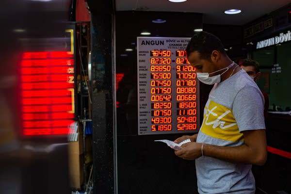 Turkey intervenes in currency markets as lira tumbles to fresh record low