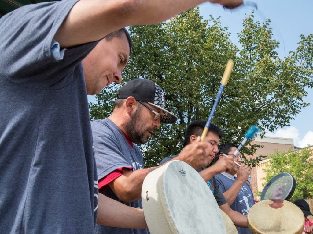 Rodney Northbird (front) and other drummers perform.
