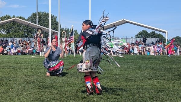 Two people dance