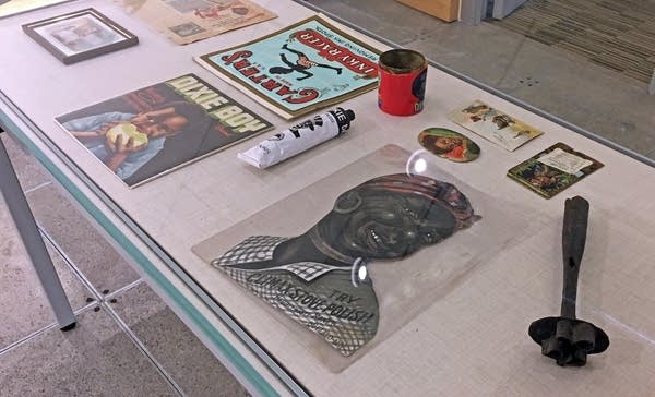 Artifacts in the exhibit includes a tool used for branding slaves.