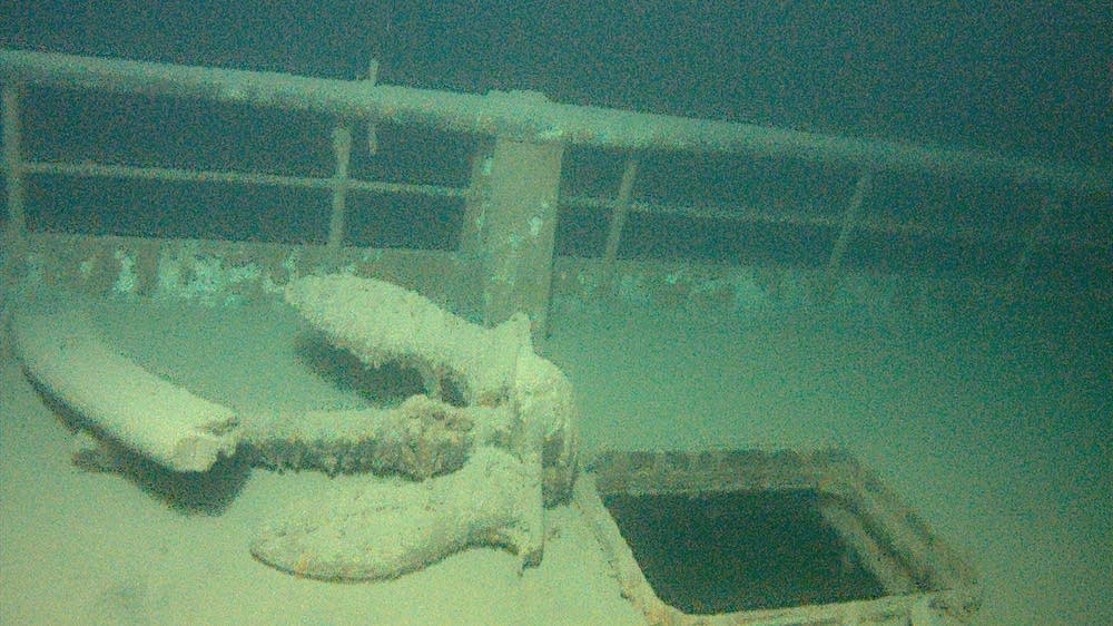 An anchor is seen on the deck of the wrecked freighter Hudson