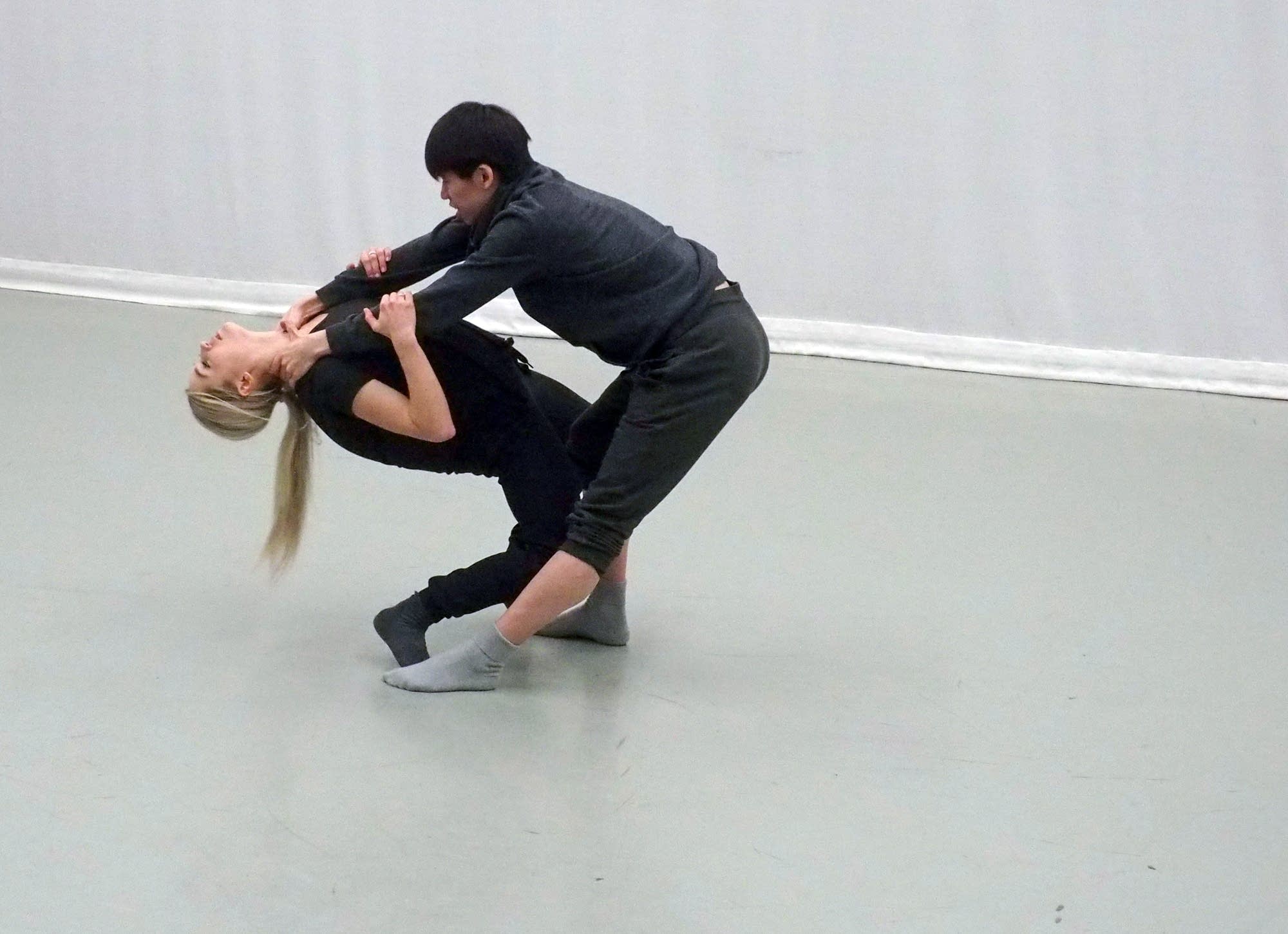Jadyn Reddy and Austin Lam improvise a scene exploring the violence.