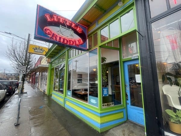 A Little Griddle eatery in Portland, Oregon, where co-owner Judd Harris has struggled to balance the prices he pays for supplies with the prices he charges customers.