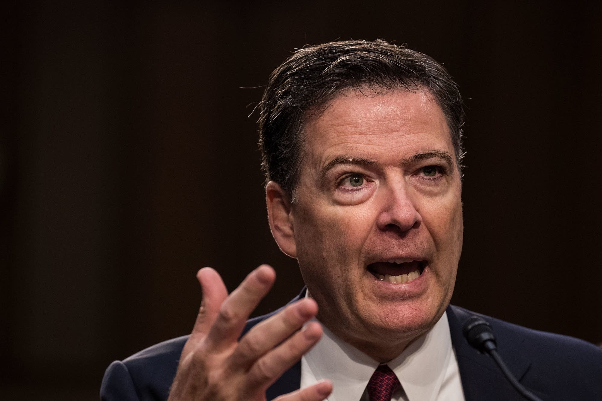 Former FBI Director James Comey testifies