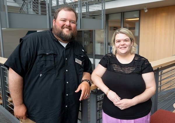 a man and a woman posing for a portrait
