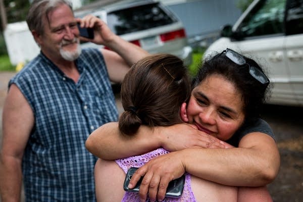 Antonia Alvarez hugs a fellow resident.