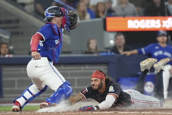 Addison Barger hits go-ahead double in 8th as Blue Jays rally to beat Twins 9-8