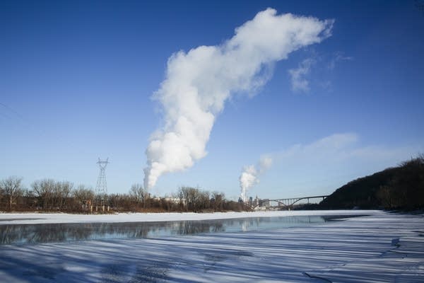 Plumes of vapor rise above the Mississippi River.