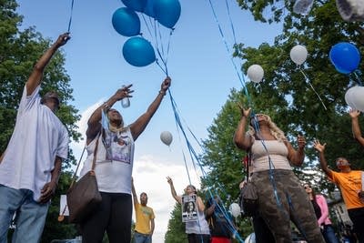 People release balloons 