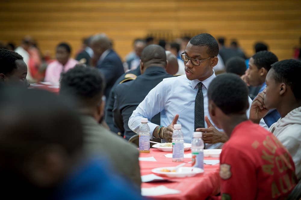 DeShawn Woods at the 100 Black Men Strong rally.