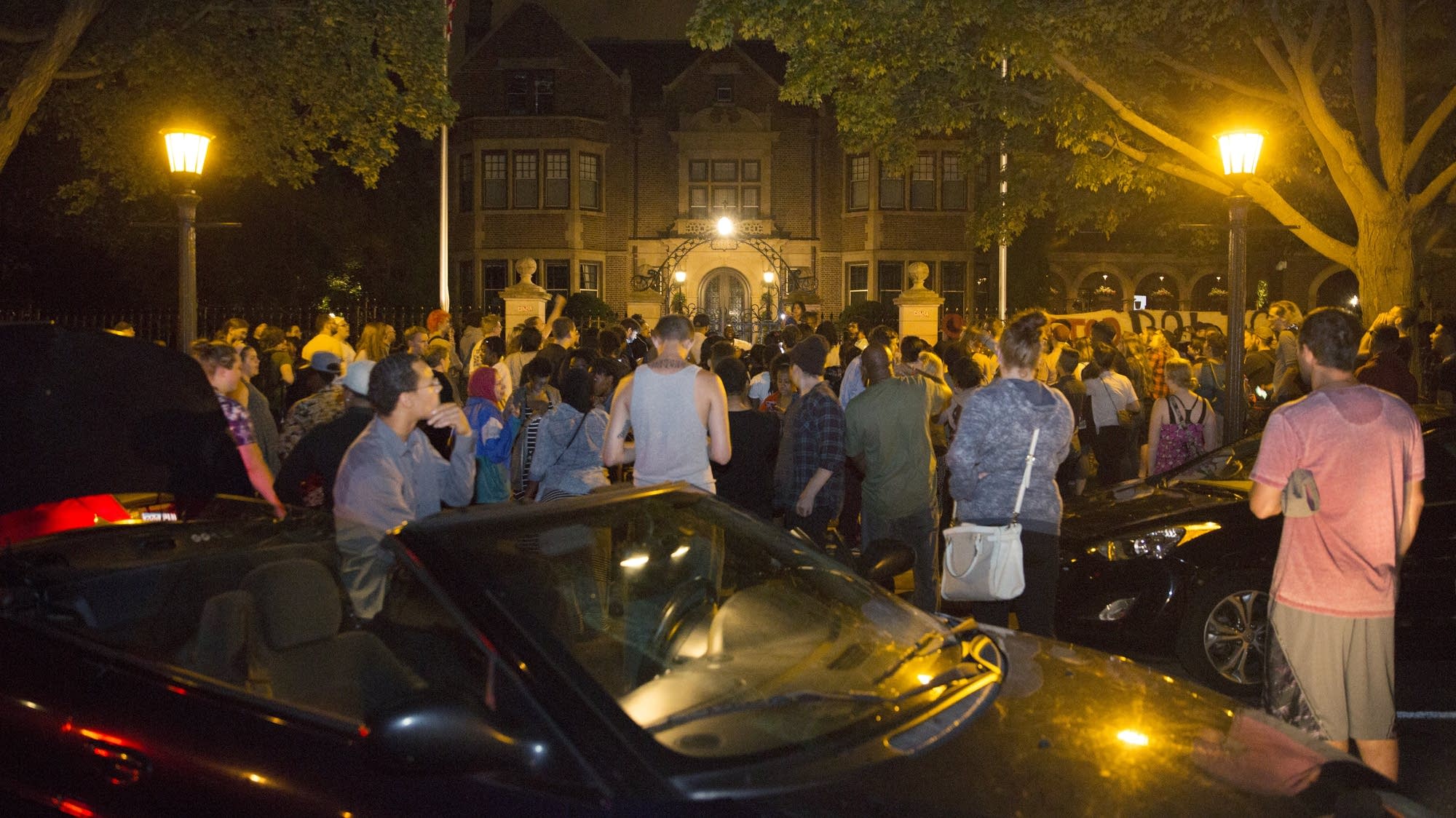 Protesters gather outside of Governor's Mansion.