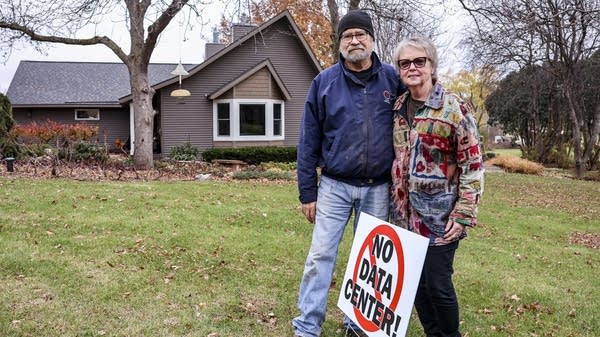 Gary and Cathy Johnson, pictured in front of their Farmington home in November 2024. Since then, they have fought the construction of a nearby data center, but construction is now moving forward.