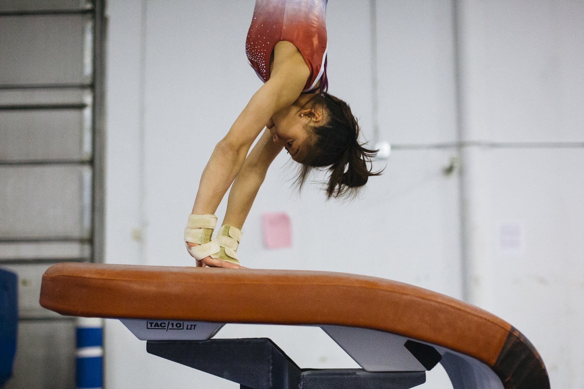 Sunisa Lee springs off of vault.