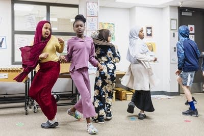 Fifth-grade students dance to the beat of the music 