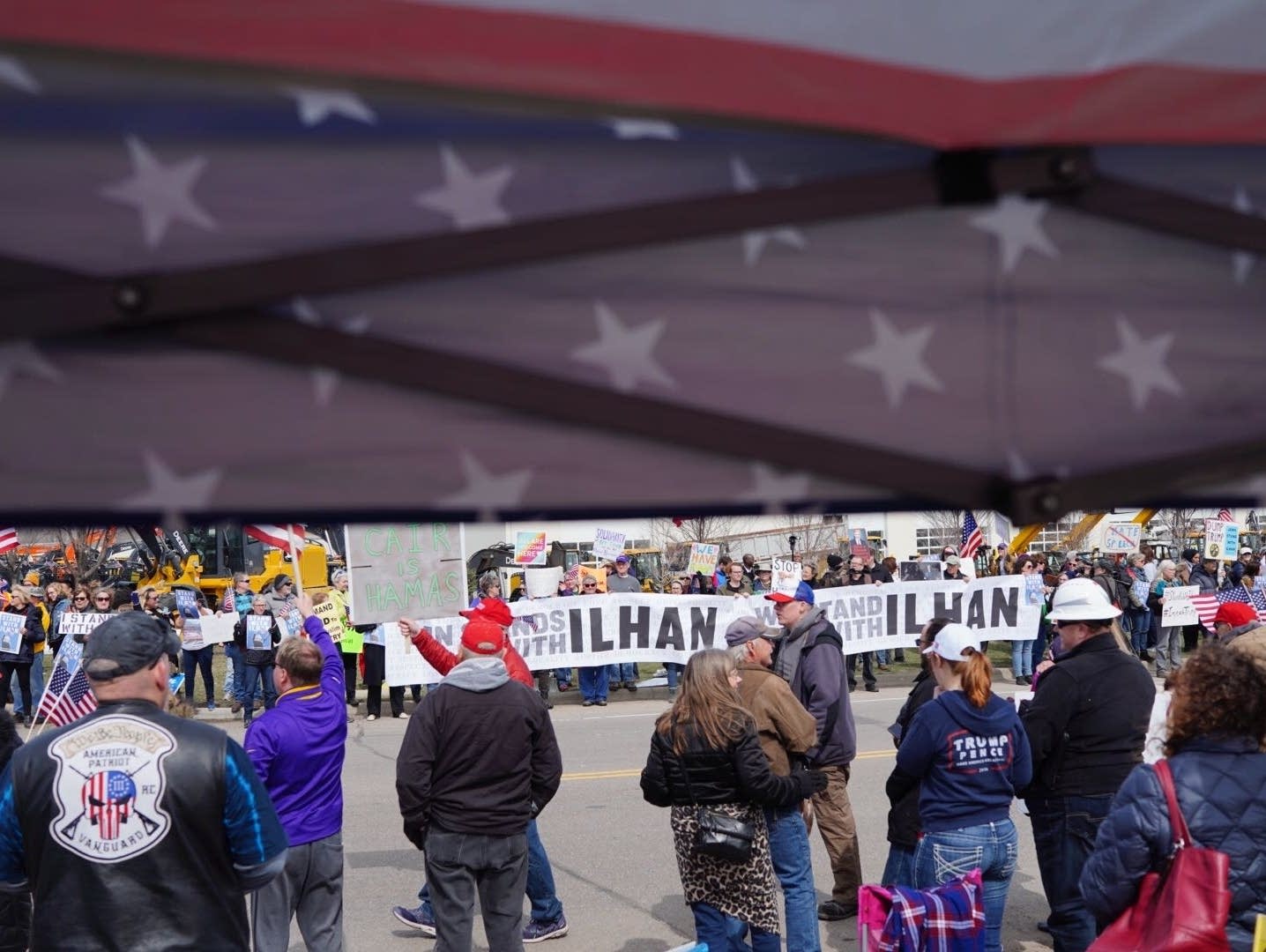 Supporters wait for the president to arrive in Burnsville, Minn.