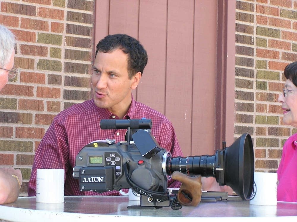 With a camera