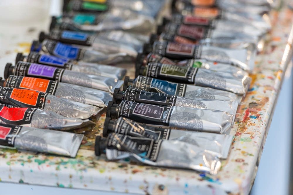 Tubes of paint line the counters