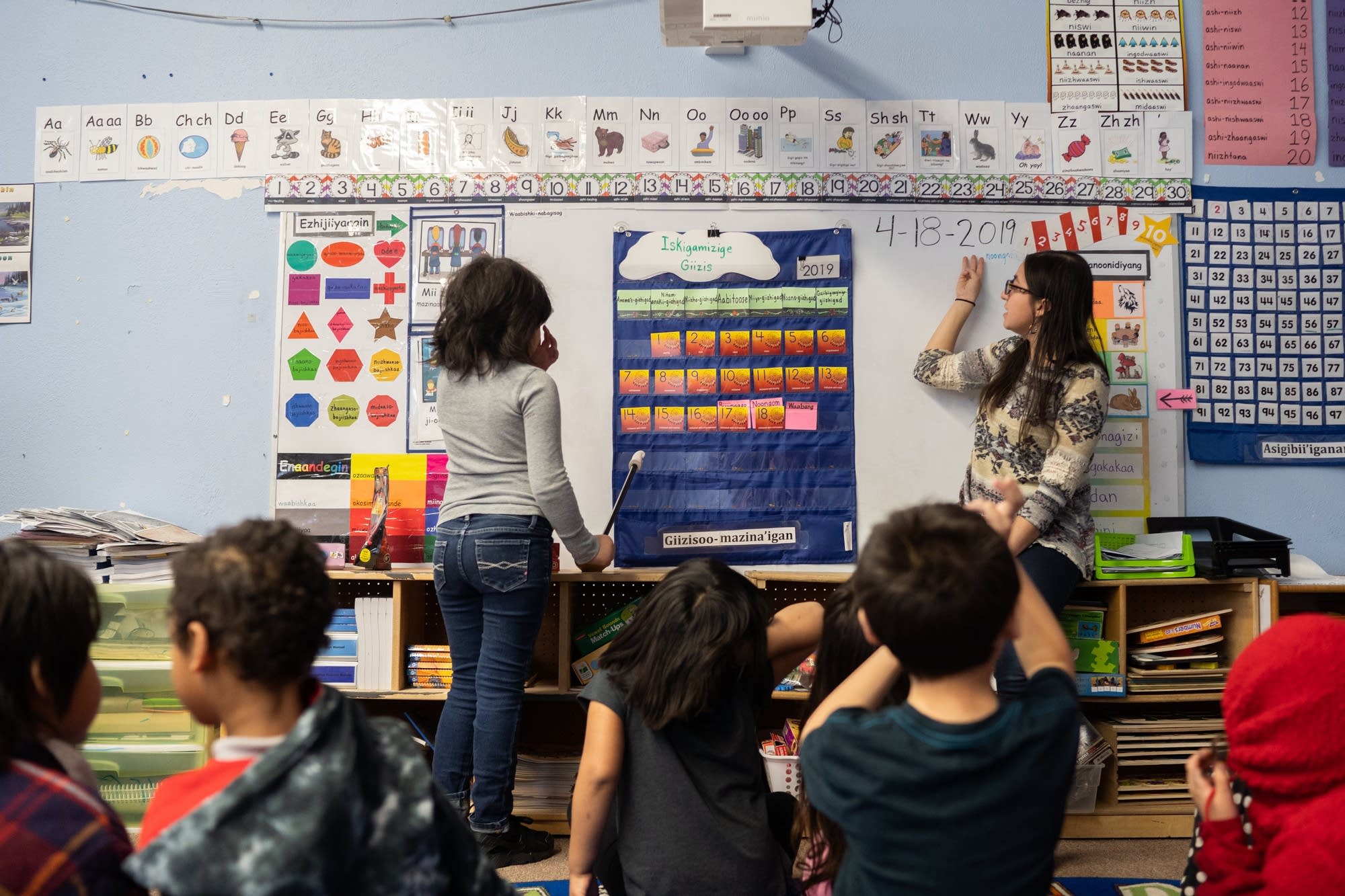 Binesiikwe Briggs leads her first grade and kindergarten class.