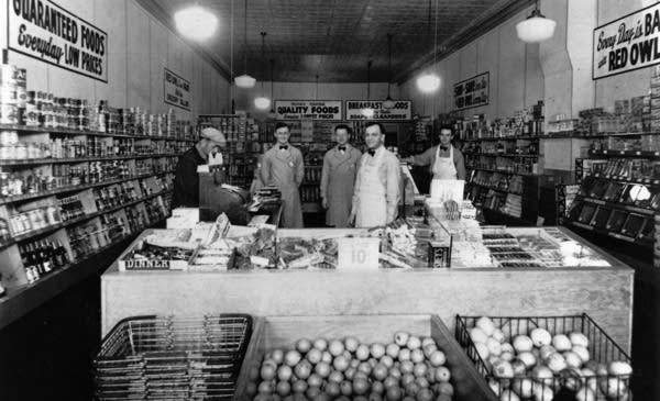 A group of people in a grocery store