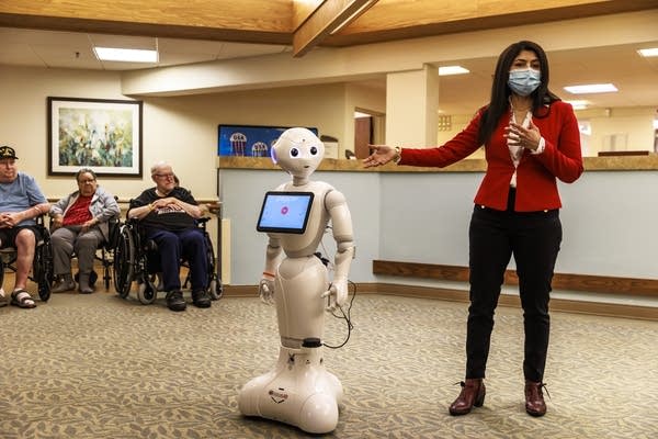 Nursing home robots dance, sing and watch for signs of trouble