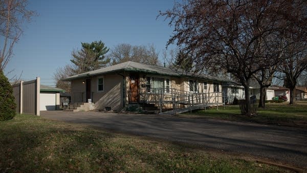 A one-story house with a driveway