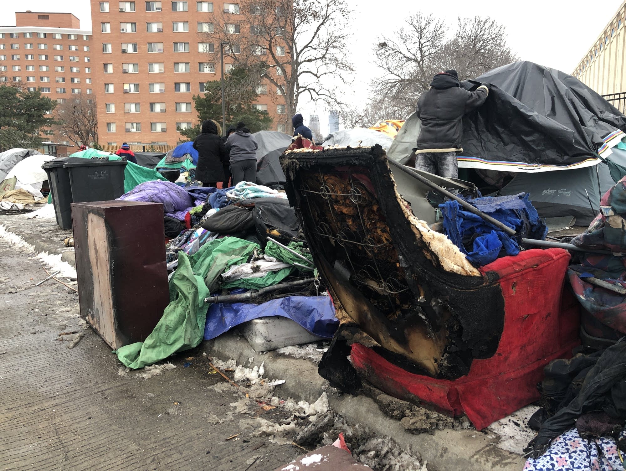 Minneapolis firefighters start fire watch at homeless ...