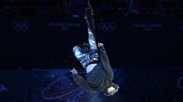 Ilia Malinin performs a backflip.