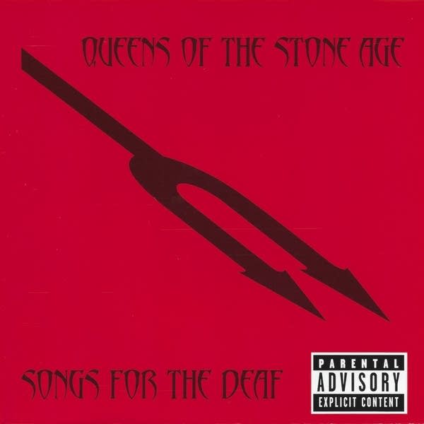 Red album cover with a two-pointed fork.