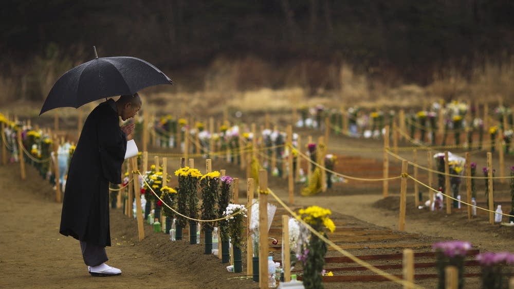 Debris, challenges pile up in Japan 1 month later | MPR News