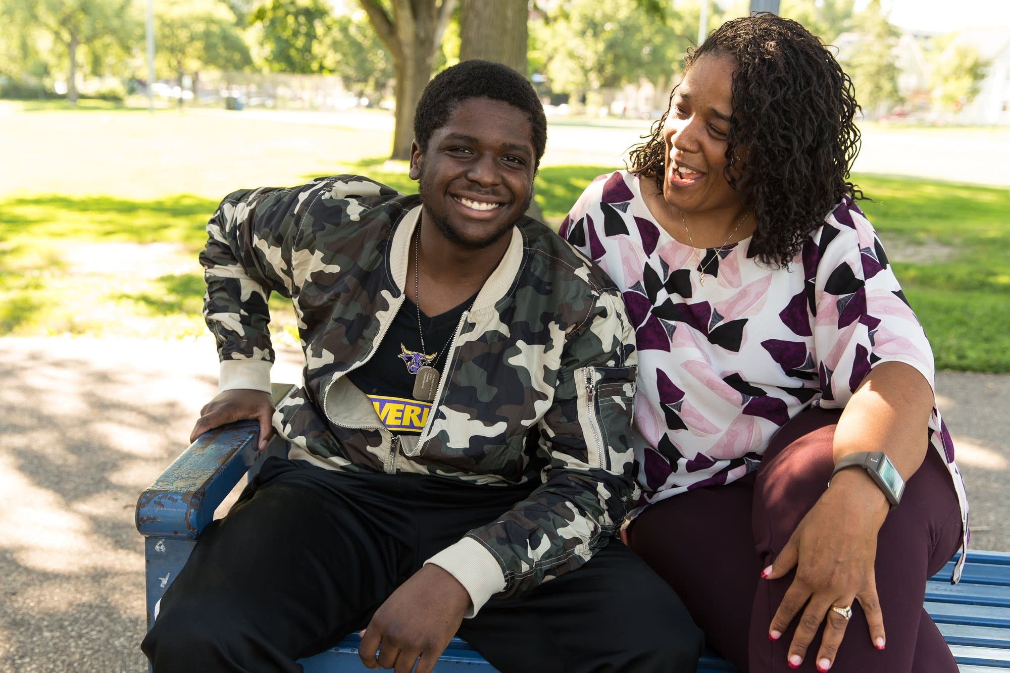 Trey, 22, and Rae Blaylark, sit for a portrait in Stewart Park.