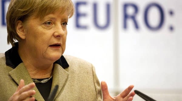 German Chancellor Angela Merkel delivers a speech during a celebration to mark 10 years of the euro in Berlin on Jan. 23, 2012. European leaders agreed today on a deal for more fiscal unity, based around the German model of austerity.