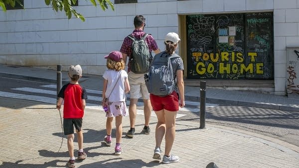 In Barcelona, a tourism paradox