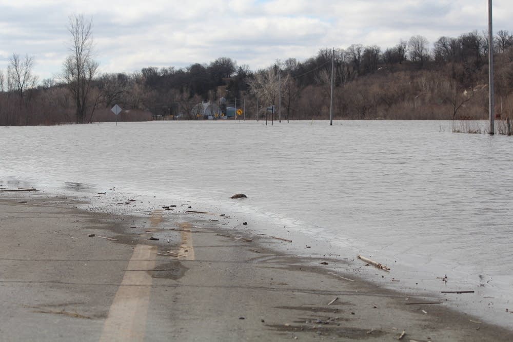 Closed off by flooding, Henderson copes by throwing a party; Red River