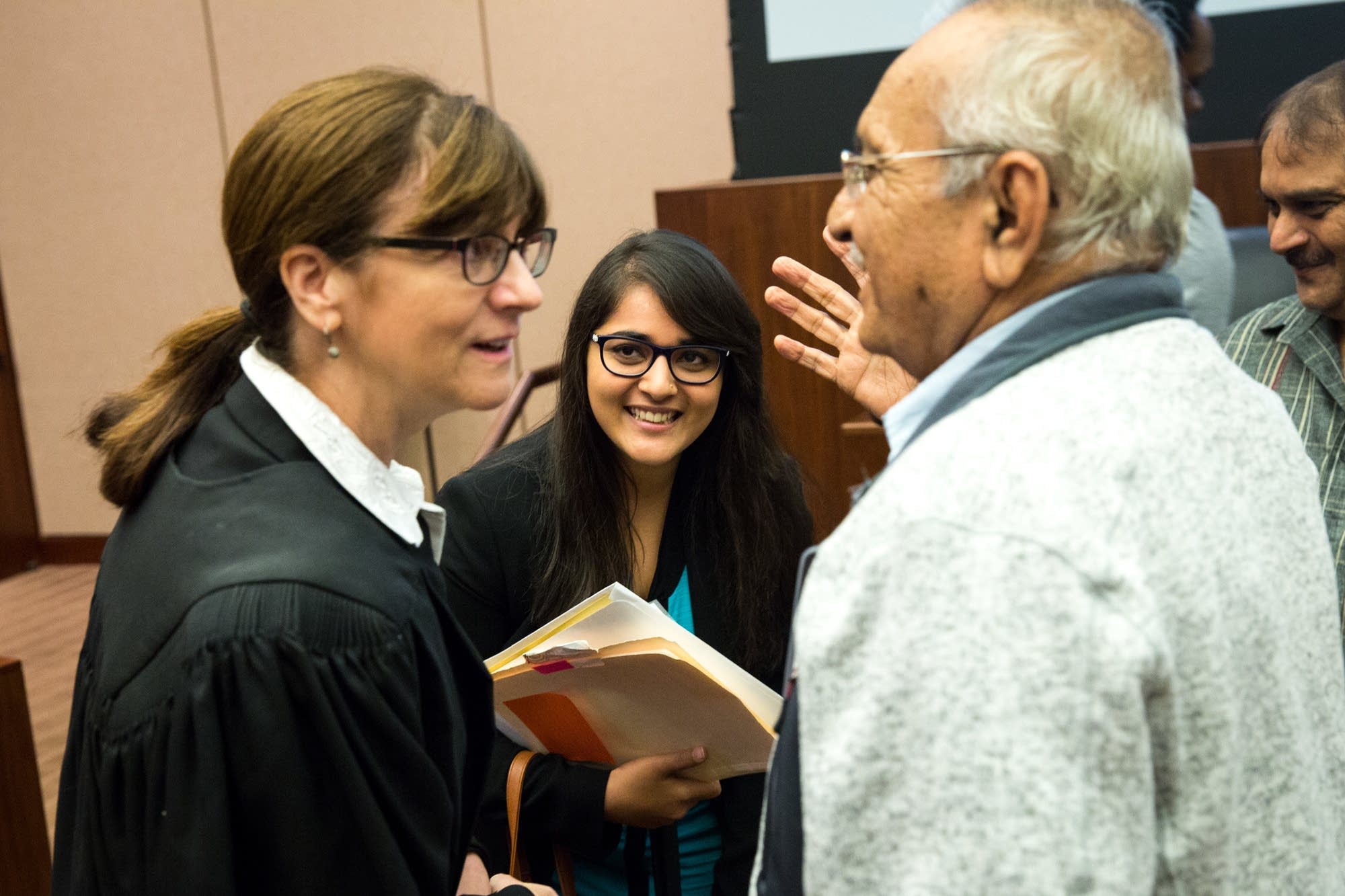 Judge Becky Thorson socializes after the ceremony.