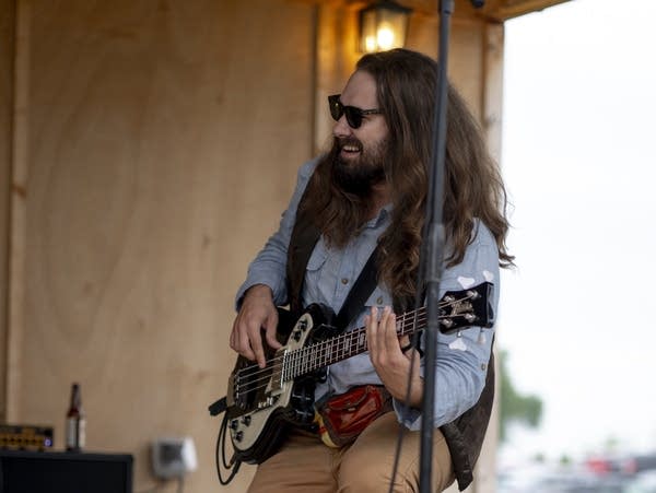 Taylor James Donskey performing in Clare Doyle's band at The Current Happy Hours at Milk & Honey Ciders in St. Joseph on Thursday, June 27, 2024.