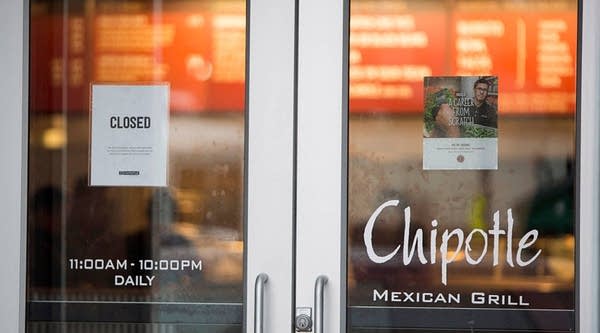 A sign showing a Chipotle Mexican Grill in Boston, Massachusetts, which closed on December 8, 2015 after 80 students at Boston College had gotten sick from eating at the fast food chain. On Monday, February 8, 2016, Chipotle will close for lunch to review food-safety protocols with employees.