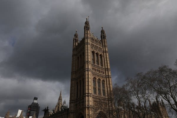 Storm clouds gather over Westminster Abbey in London.